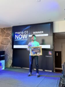 Bahez holding the prize